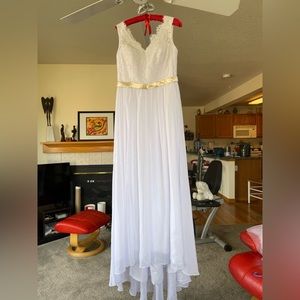Wedding dress - never been worn. White with gold ribbon band